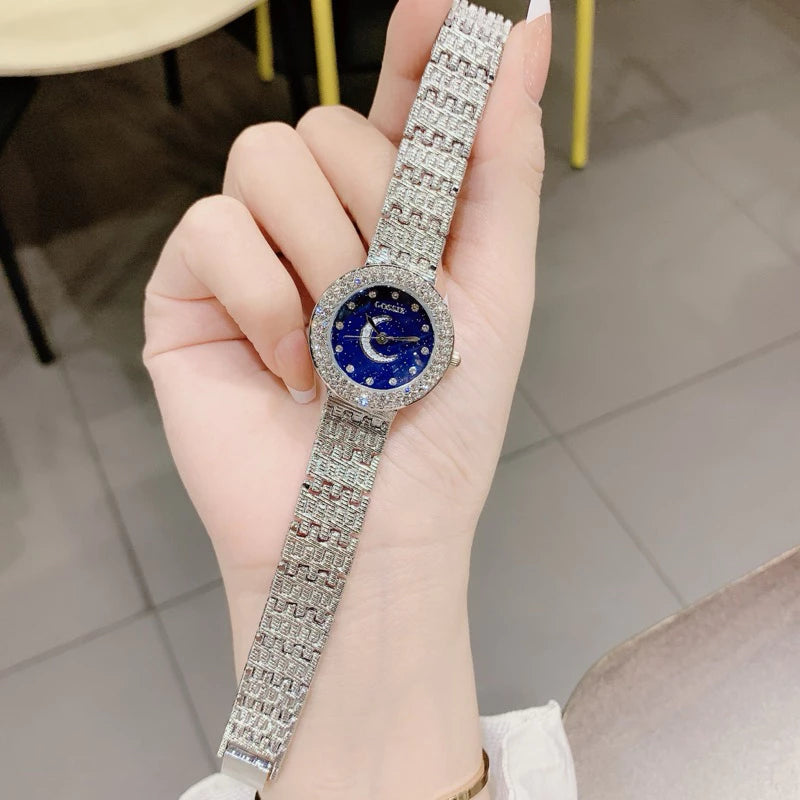 Elegant Women’s Watch with Moon & Star Dial and Sparkling Crystals